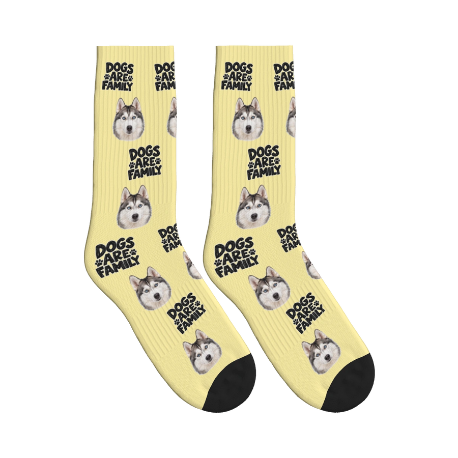 Dogs Are Family Bold Socks in Pale Yellow with a custom dog face and Dogs are family lettering
